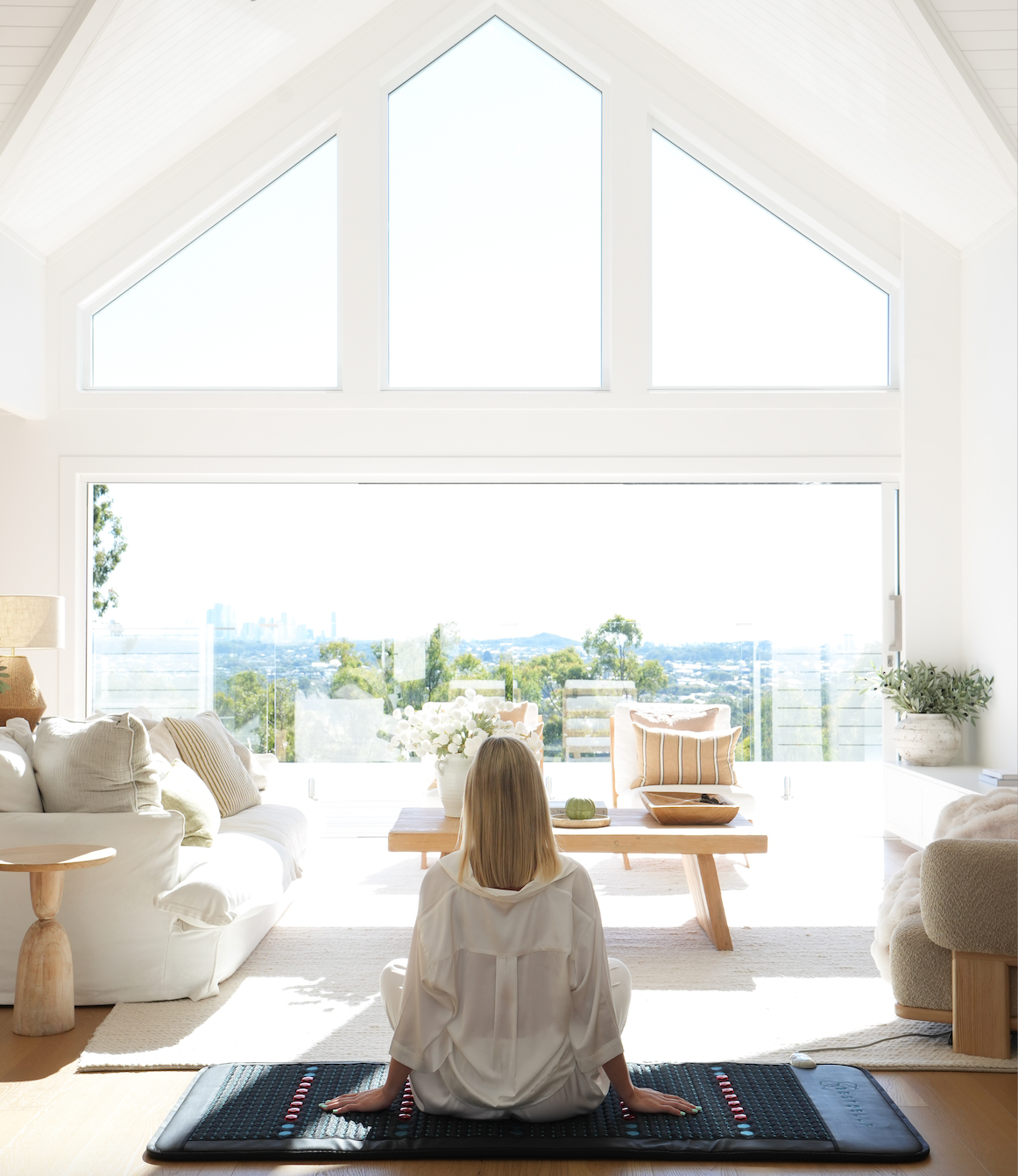 Candice resting on mat in sunlight