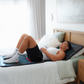 Brett using the mat on bed