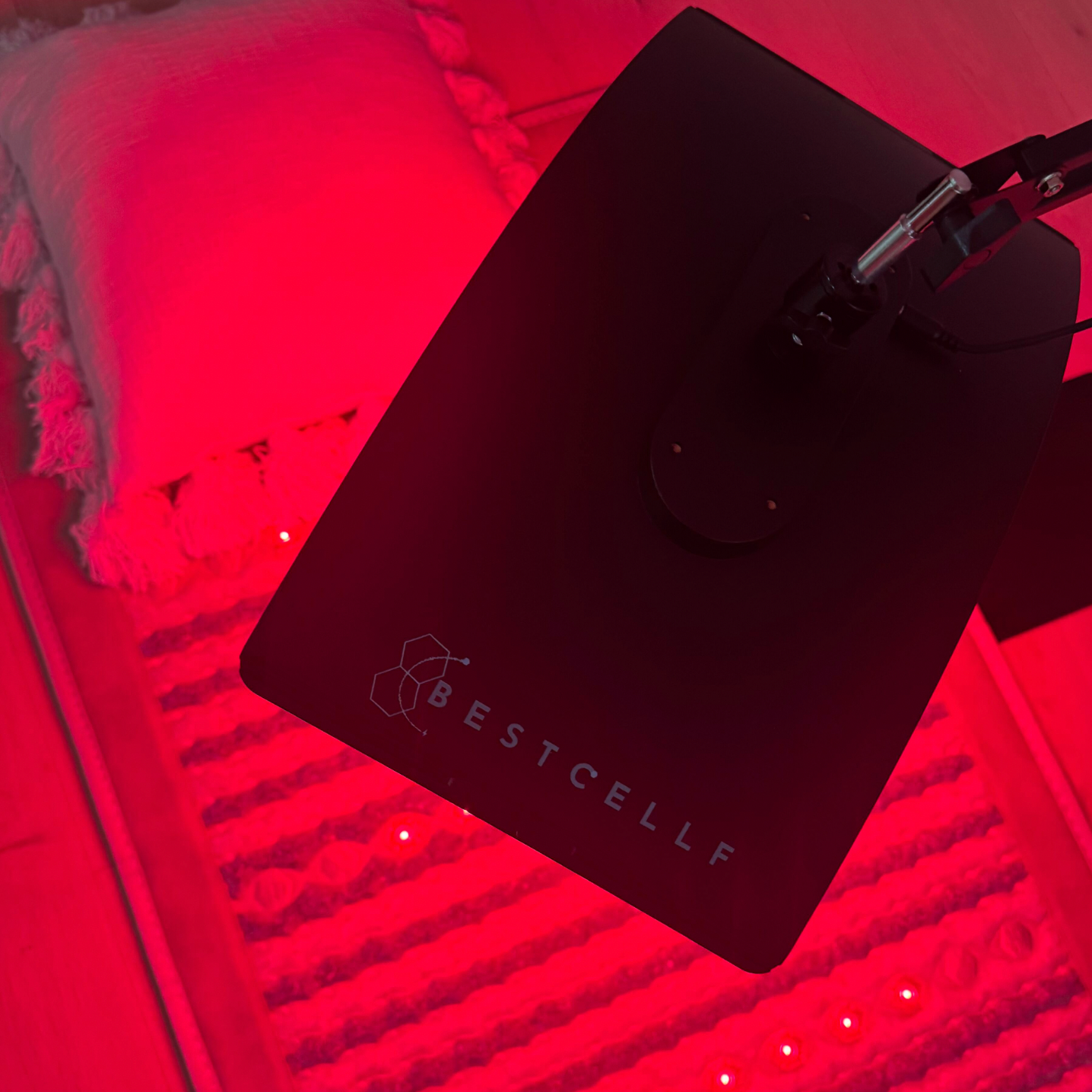 Red light lamp over PEMF mat